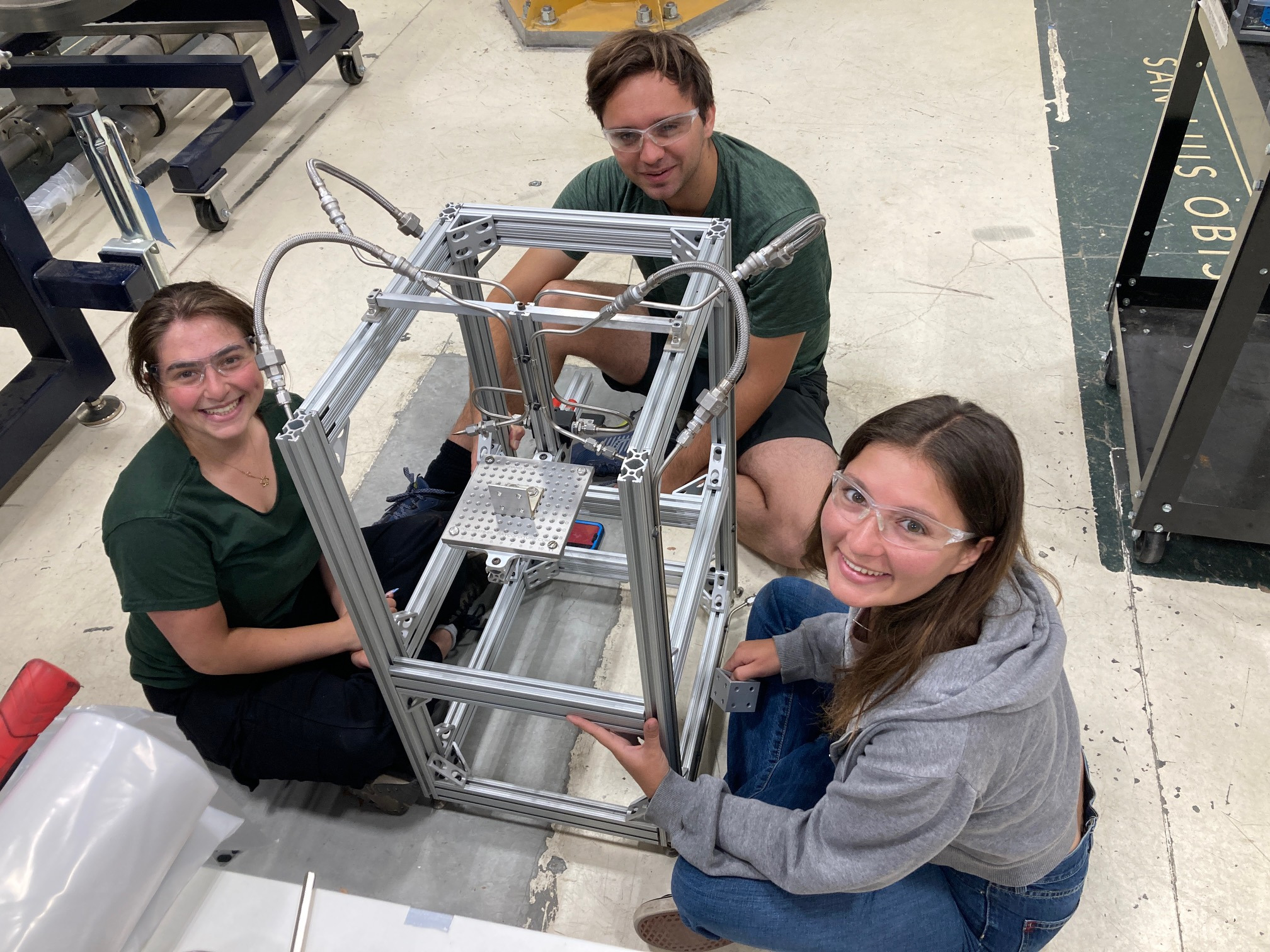 students working on a thrust stand