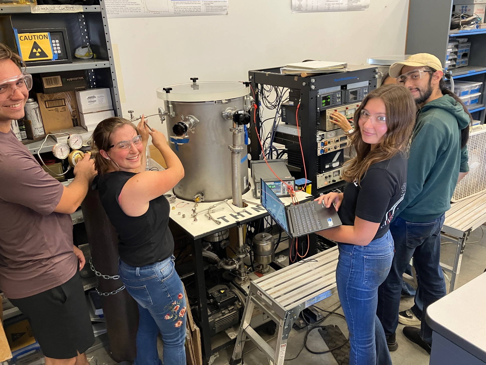 students working in cal poly vacuum chamber lab